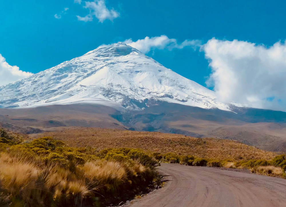 Snow-capped Cotopaxi volcano rising above highland plains, symbolizing Ecuador’s constitutional recognition of the Rights of Nature.