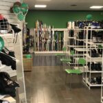 Indoor view of Fritidsbanken showing rows of outdoor gear available to borrow.