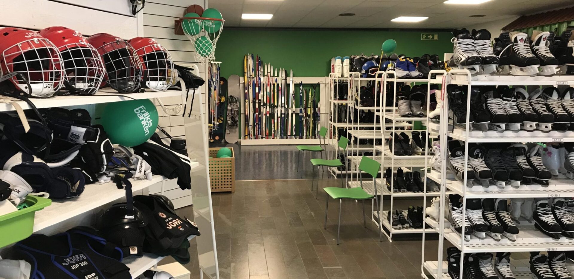 Indoor view of Fritidsbanken showing rows of outdoor gear available to borrow.